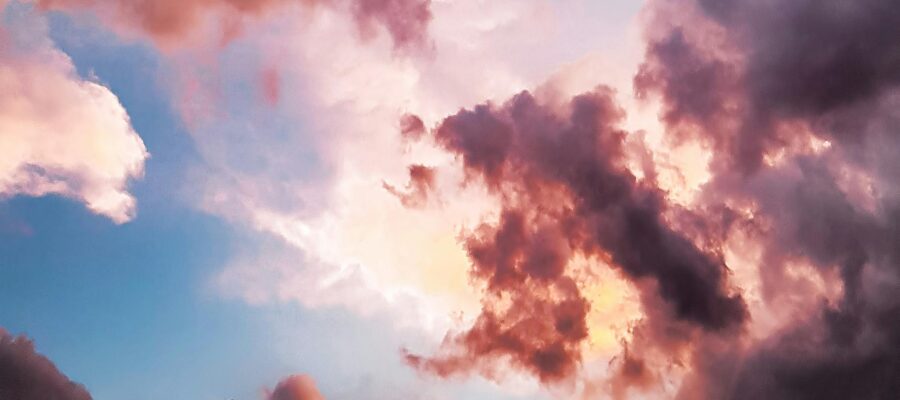 down angle photography of red clouds and blue sky