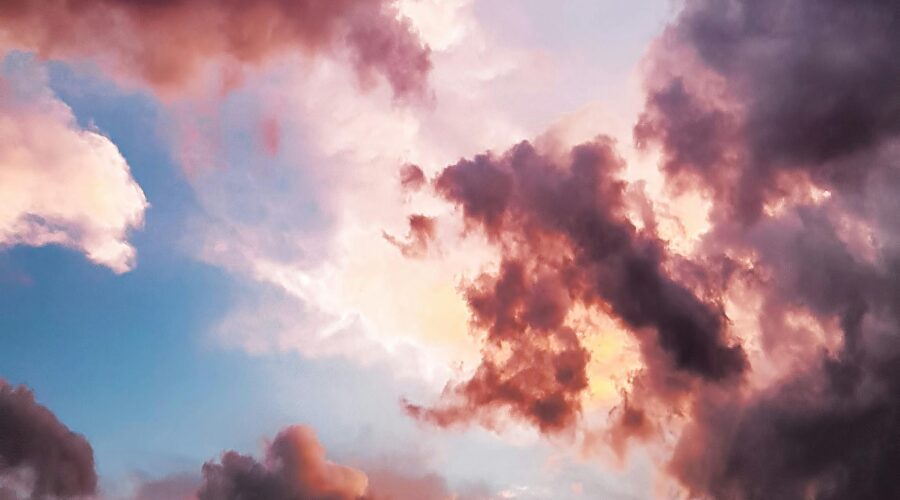 down angle photography of red clouds and blue sky